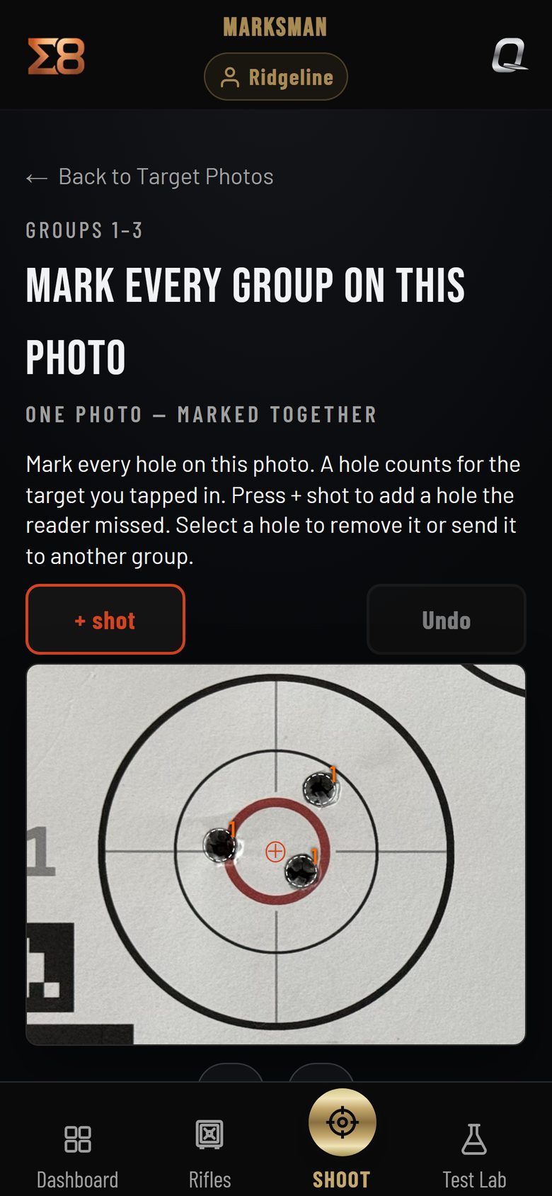 The marking screen on a phone: a fired Sigma8 target with three holes marked in Group 1, and the + shot and Undo buttons.