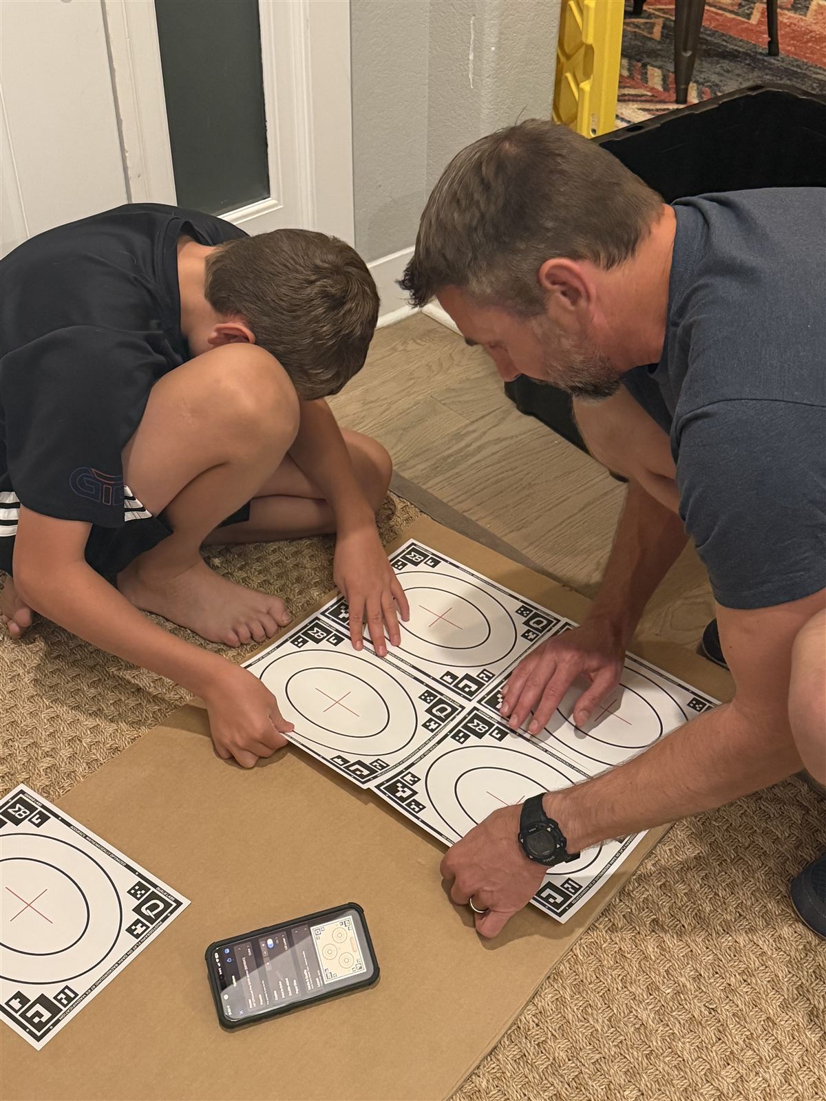 Chad and Chase preparing Sigma8 calibrated targets before the range
