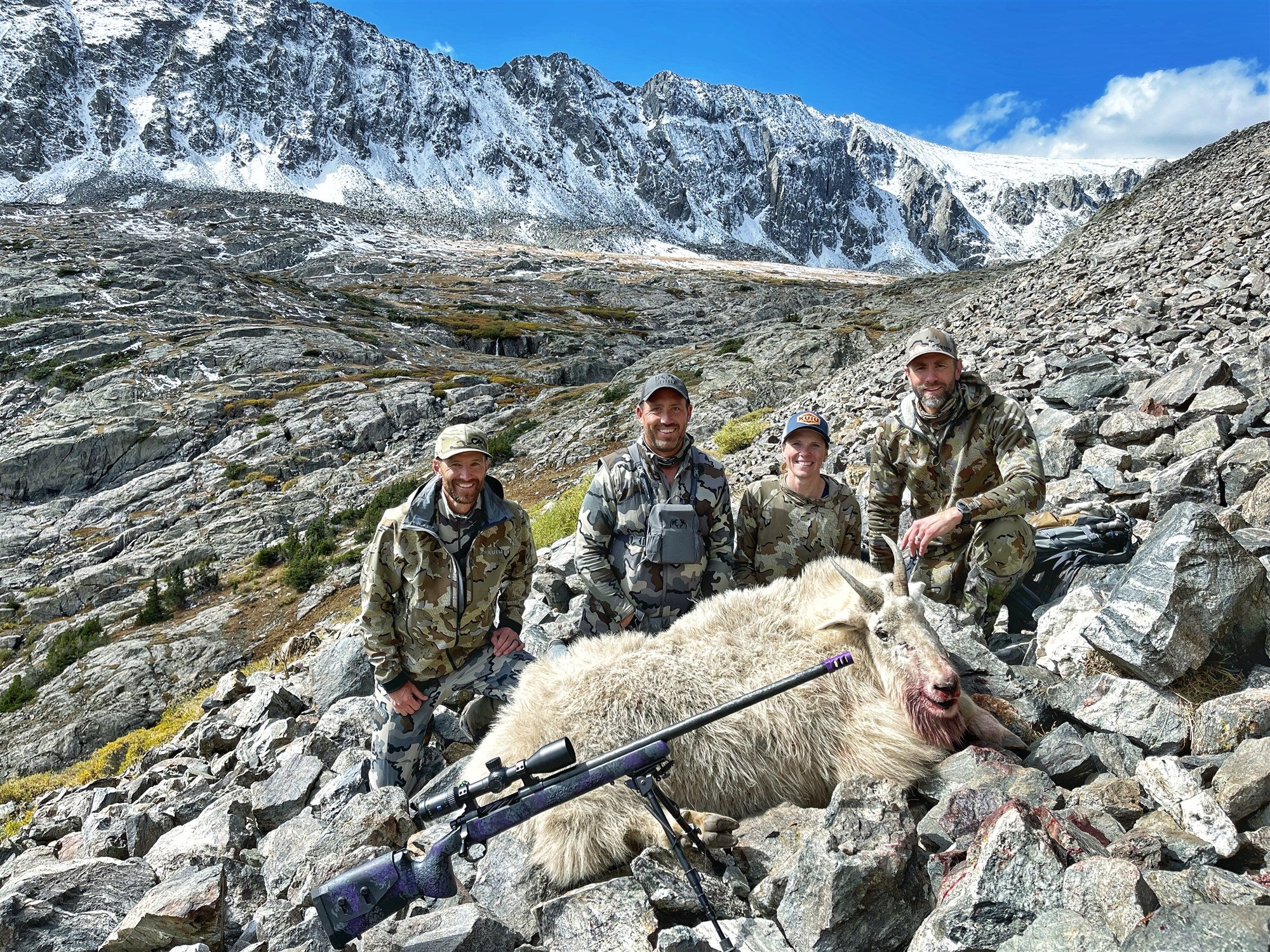 Successful mountain goat hunt in high alpine terrain